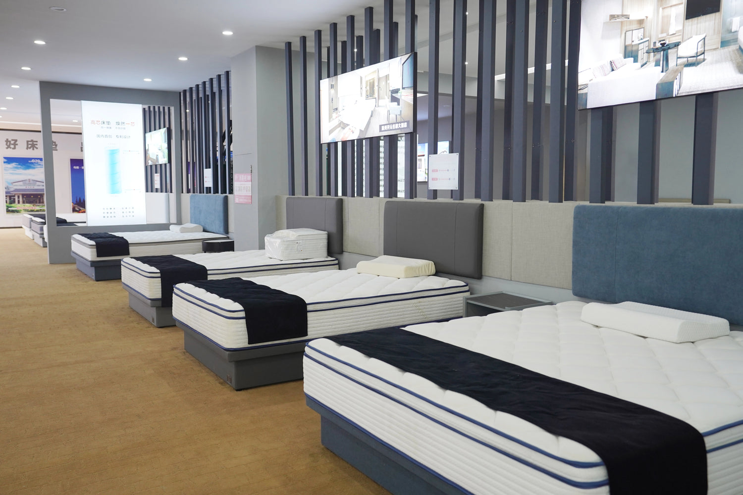 Mily mattress showroom featuring a variety of high-quality mattresses beautifully displayed for customers